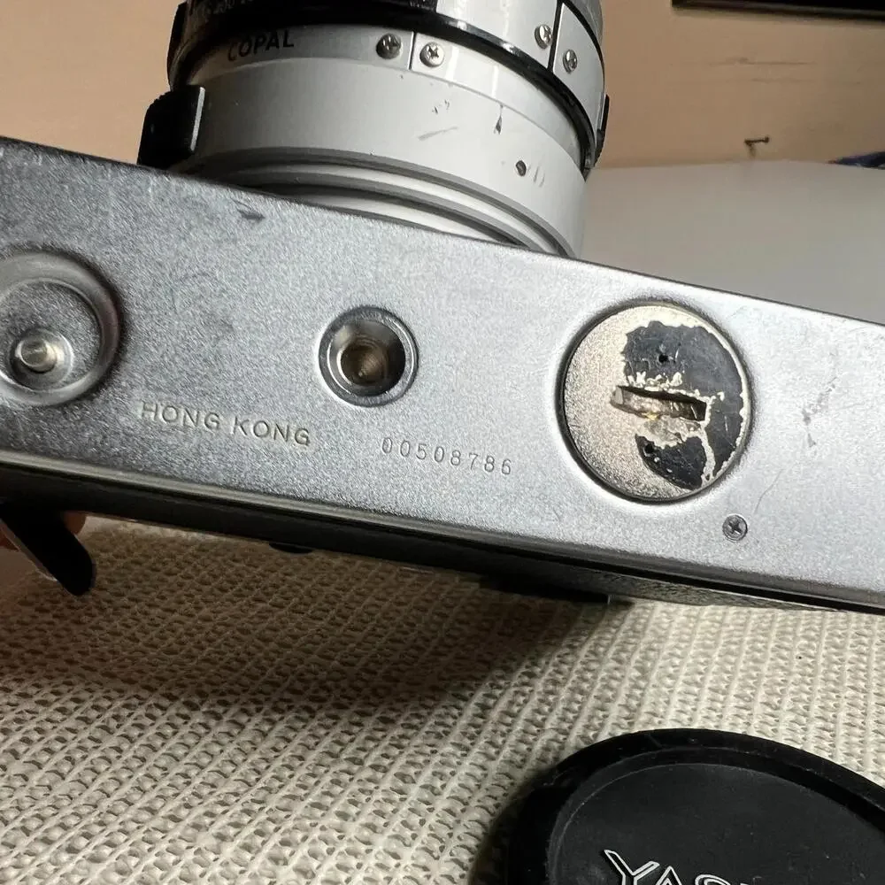 Yashica MG-1 35mm Rangefinder Film Camera 45mm f/2.8 Lens Made in‎ Hong Kong Cap